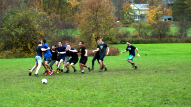 Stucents celebrate on the soccer field