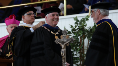 Dr. O'Reilly received the presidential chain of office from Mr. Turicchi