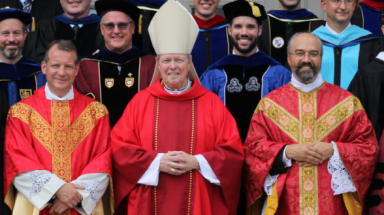 Bishop Scharfenberger poses with the East Coast chaplains