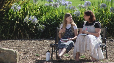 Two students on bench