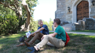 Students talk outside the Chapel