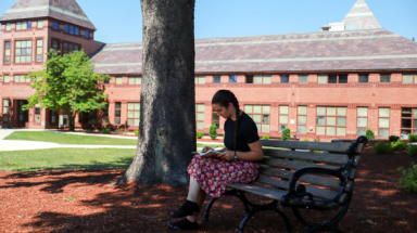 Student studies outside Dolben Library