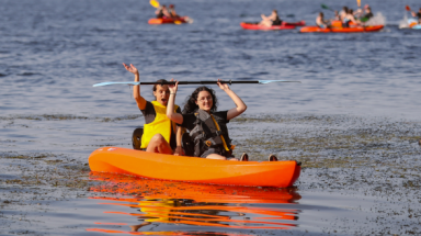 Two out on the river in a kayak