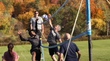 Fighting at the net to get the ball over!