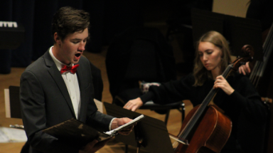 One sings and another plays cello