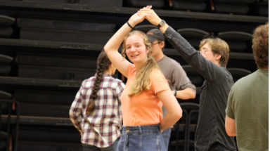 Student pairs practice a turn