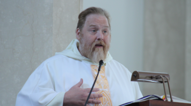 Fr. Michael Hurley delivers the homily