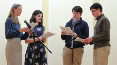 Four sing a choral piece