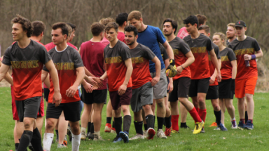 The teams shake hands