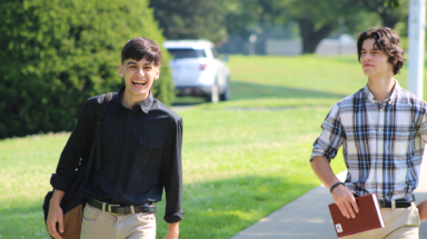 Two students walk together