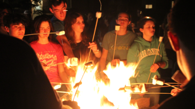 Students roast marshmallows