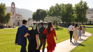 Gentlemen escort ladies to the banquet