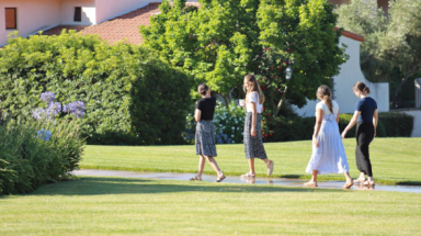 Students walk outside residence hall