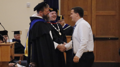 A new freshman greets President O'Reilly