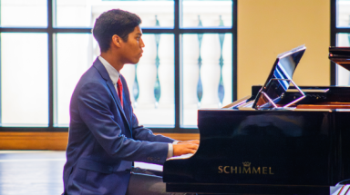 A california student plays a piano piece