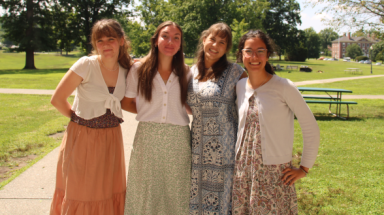 Four students on the New England campus