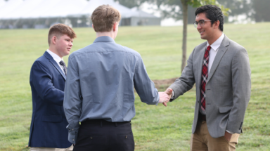 Two freshman meet an Admissions counselor