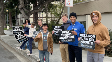 Students at praying outside Planned Parenthood