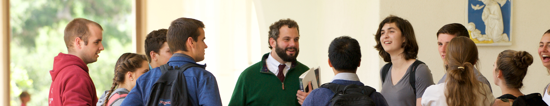 Students visit with a tutor on the California campus