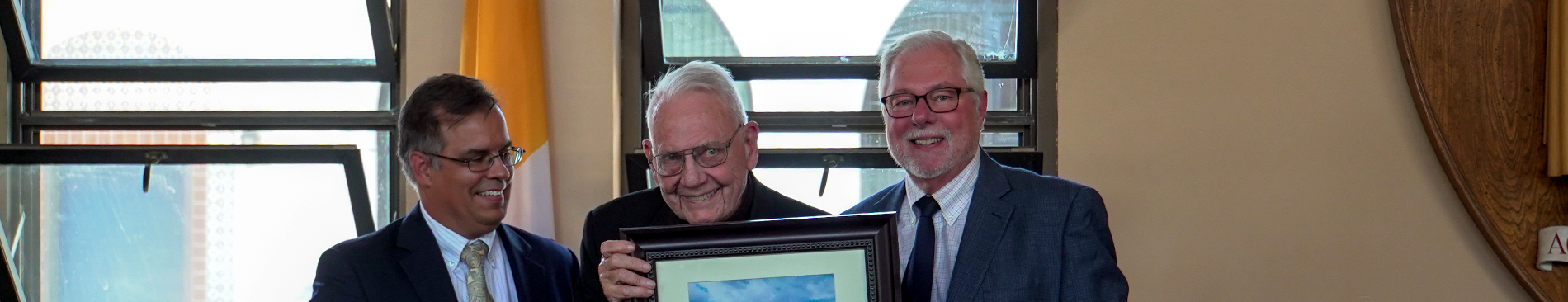 Dean Goyette, Fr. Buckley, and President McLean