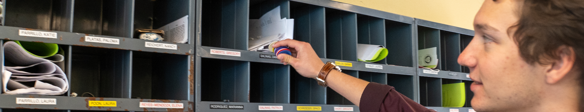 Student players poker chips in a mailbox