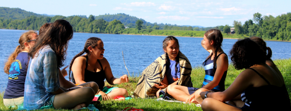 Students on the shore of the Connecticut River at the New England High School Summer Program