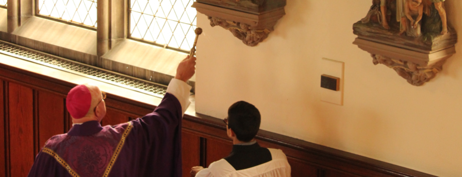 Bishop Byrne blesses the Stations of the Cross