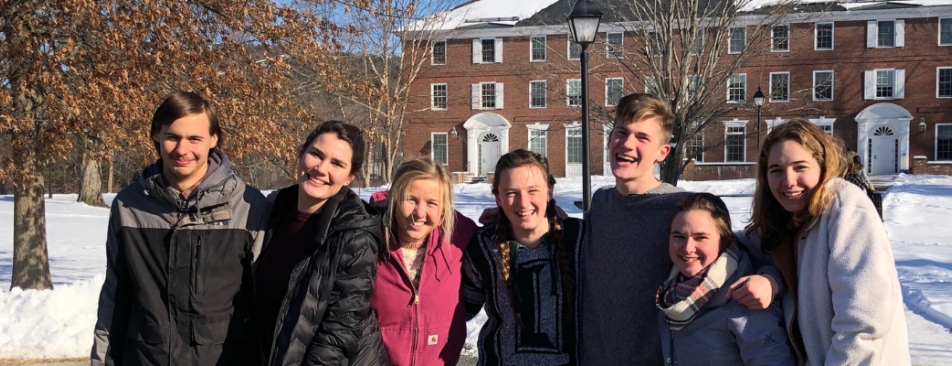 Students pose on the New England campus