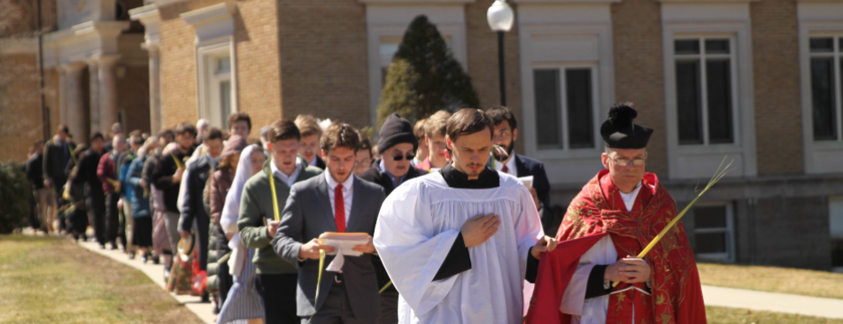 Fr. Markey, the altar servers, and the congregation process in New England