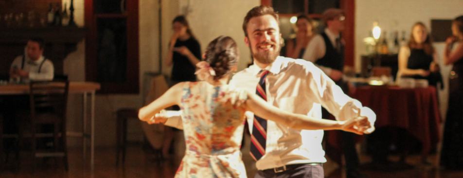 A student couple dances