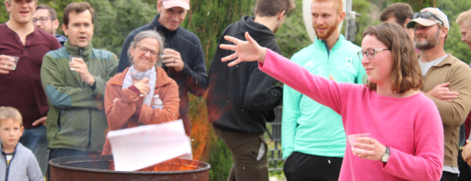 A student burns her draft