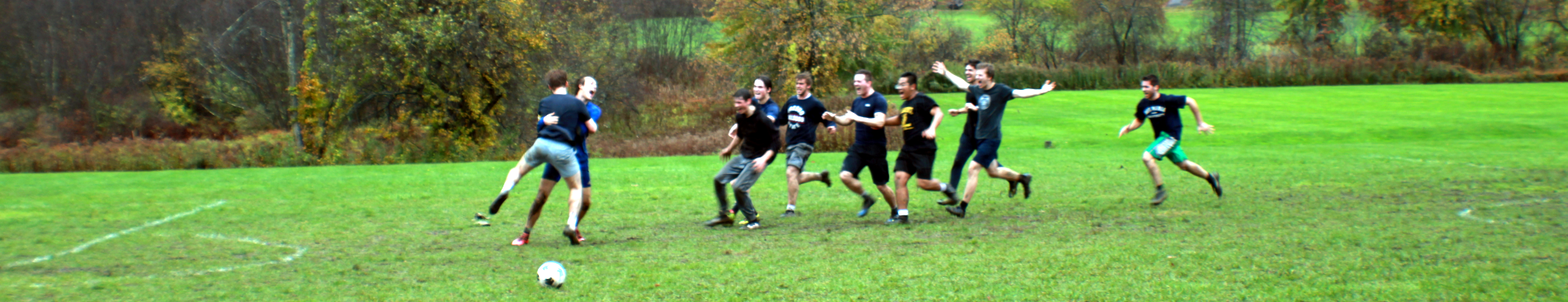 Students celebrate on the soccer field