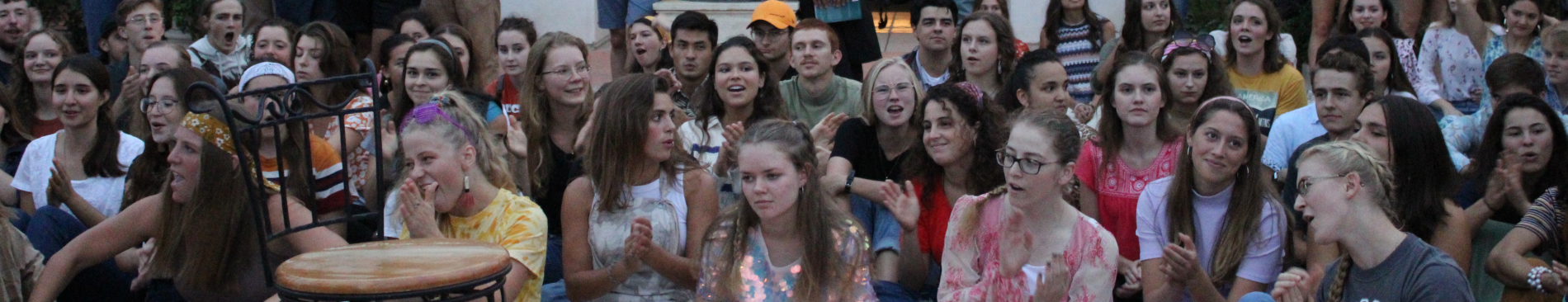 Students applaud the skit