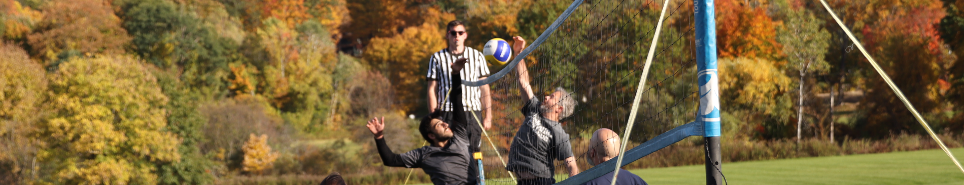 Fighting at the net to get the ball over!