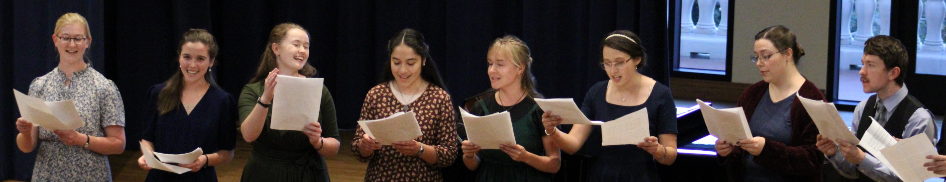 Eight (part of a larger line) sing together