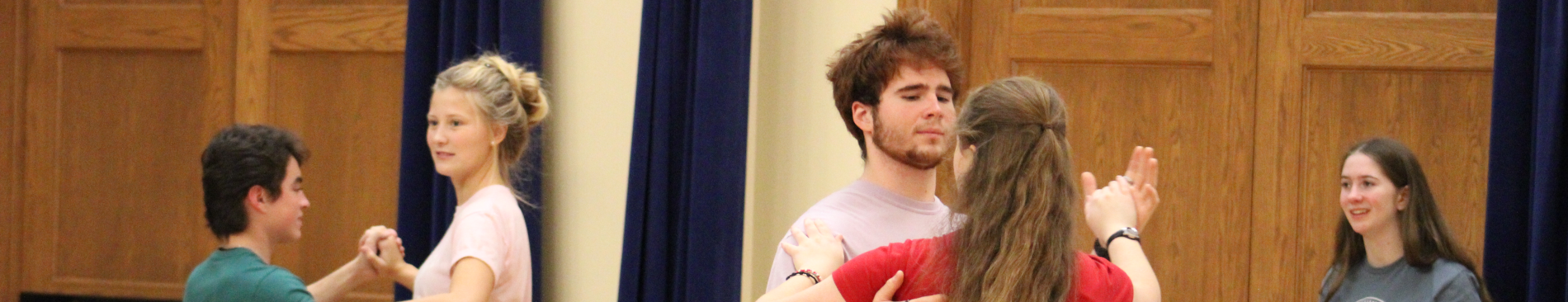 Student pairs in waltz position