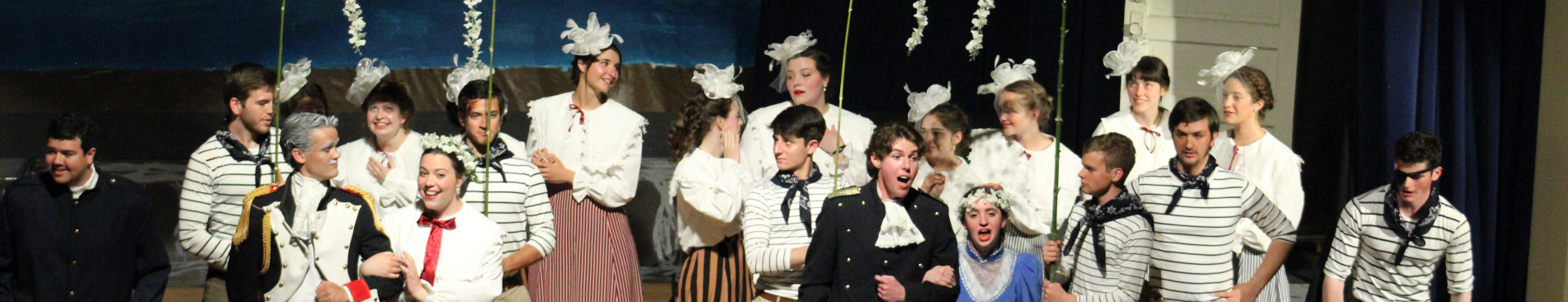 The cast singing