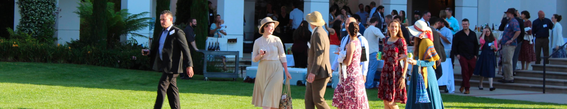 Guests walk toward the tables
