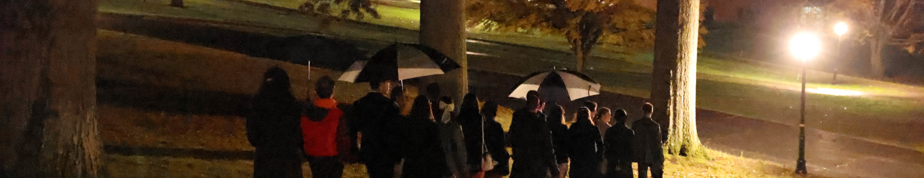 The men accompany their dates down to Tracy student center