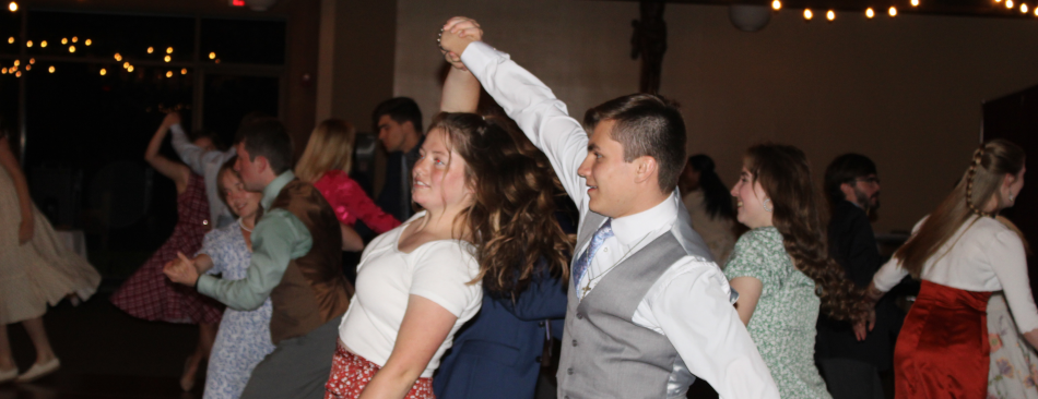 A student couple dances