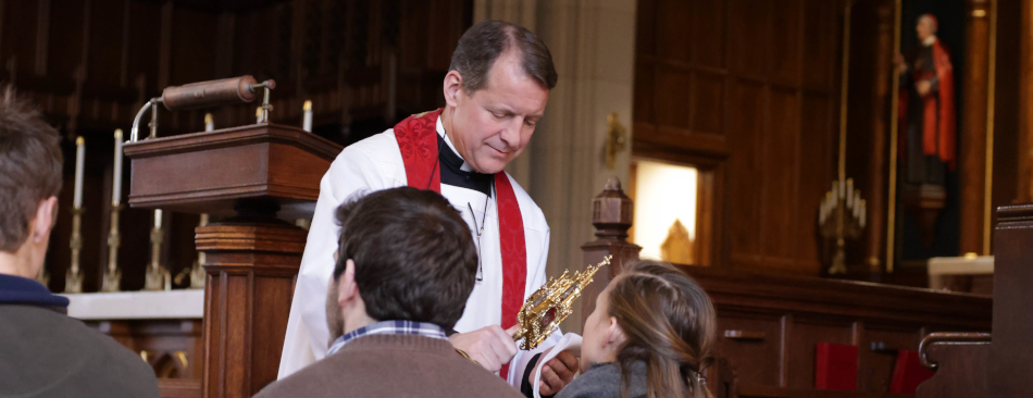 The blessing with a relic in New England before finals