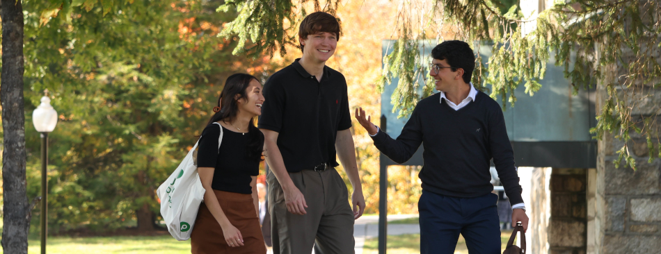 Students walk by Chapel on New England campus